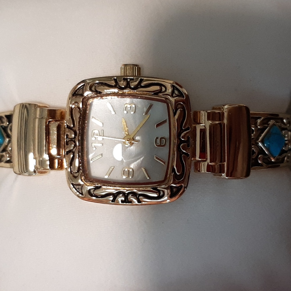 Parvana Goldtone Cuff Watch.